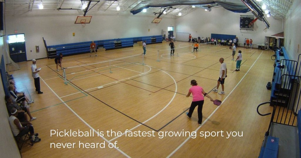 Picture of people playing pickleball - the fastest growing sport you never heard of.