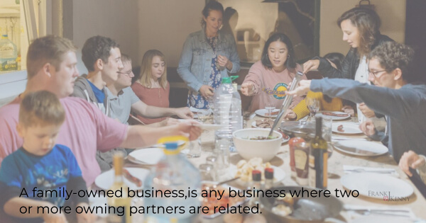 We define a family owned business as any business where two or more owning partners are related. Image of a large family having dinner at home.