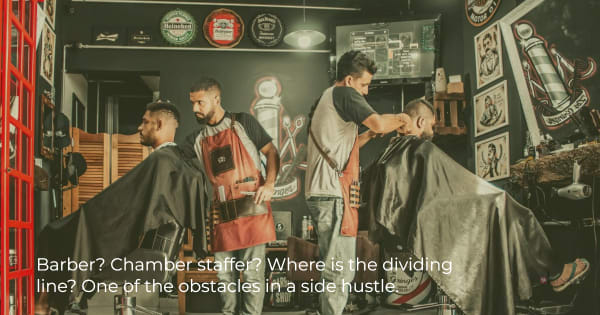 Barbers in a shop: where does the side job end and the day job begin?