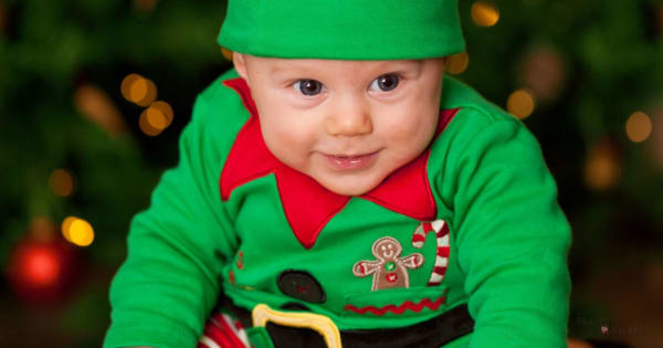 Picture of a baby dressed like a Christmas elf: the perfect kind of social media post idea for the holidays!