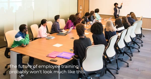 Image of meeting room training to illustrate how companies will train telecommuting employees.