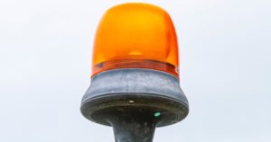 Image of a caution light as a warning about turnkey events companies.