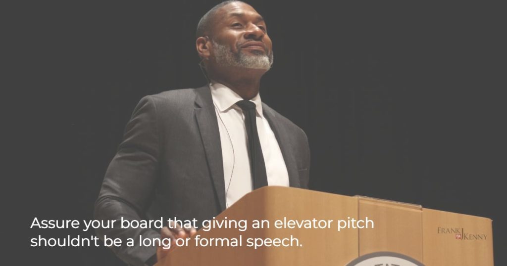Image of a man giving a formal speech to illustrate the difference from an elevator pitch.